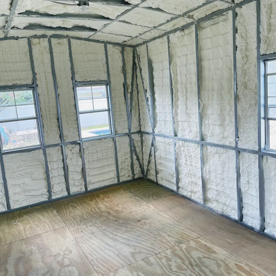 Closed-cell spray foam insulation applied to wall cavities in a residential project in Paris